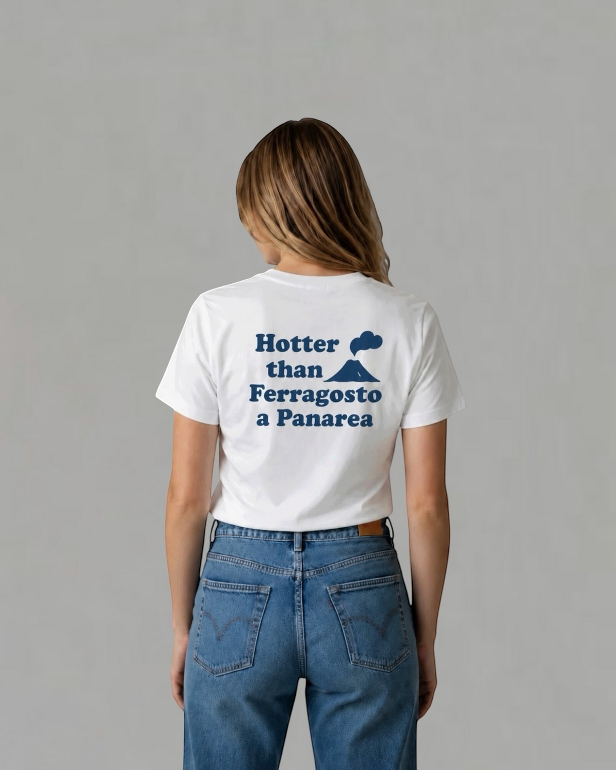 Hotter Than Ferragosto a Panarea white t-shirt with navy back print, worn by a man