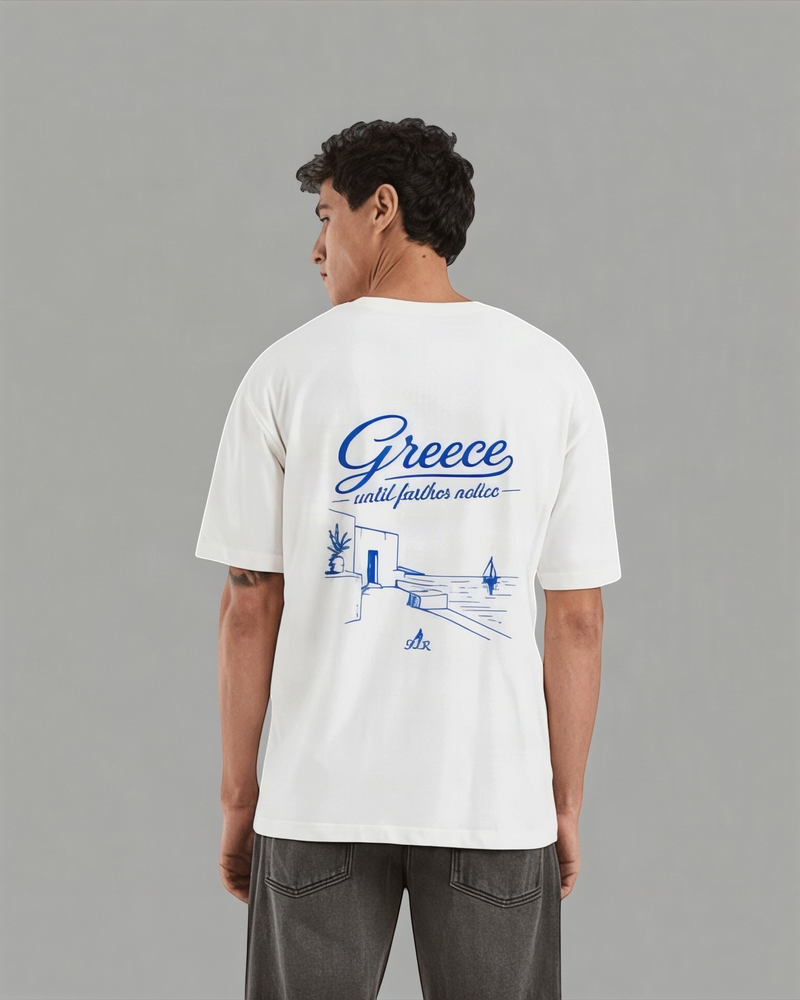 Greece Until Further Notice off-white t-shirt with blue back print, worn by a man